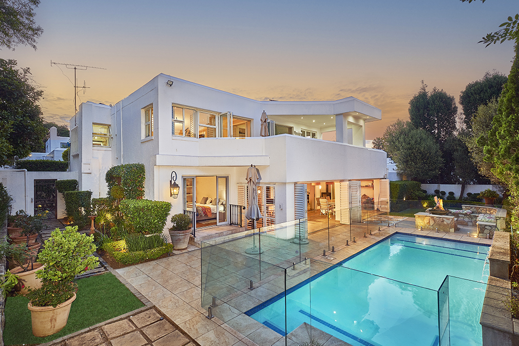 Real estate photography -double storey white house at dusk